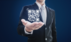 man holding qr code